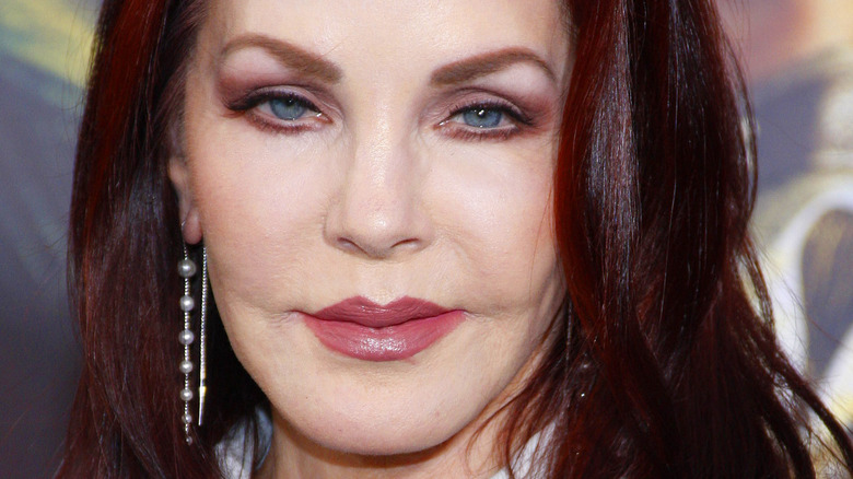 Priscilla Presley smiling at event