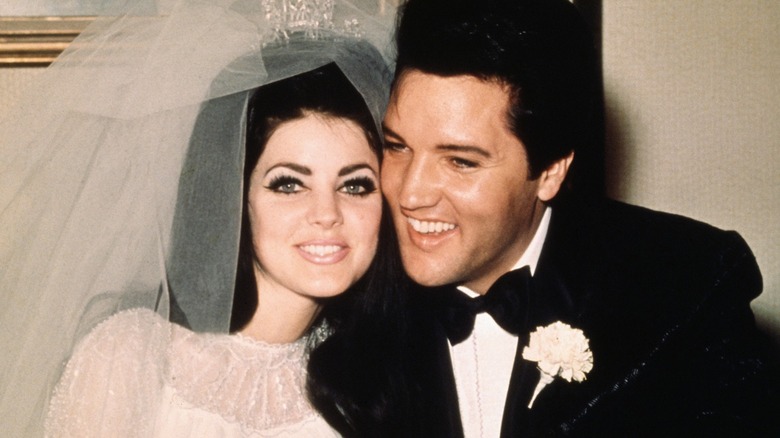 Priscilla and Elvis Presley on their wedding day