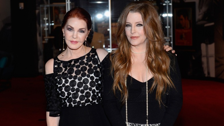 Priscilla and Lisa Marie Presley posing in 2015