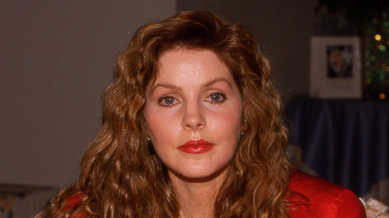 Priscilla Presley staring at the camera