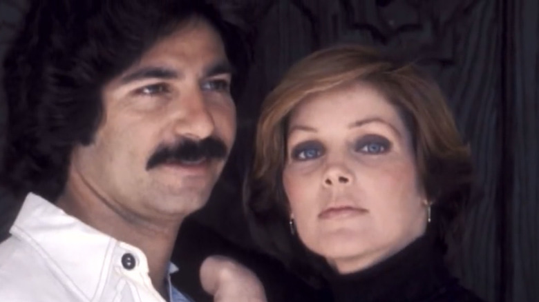 (l-r): Robert Kardashian and Priscilla Presley posing together outside
