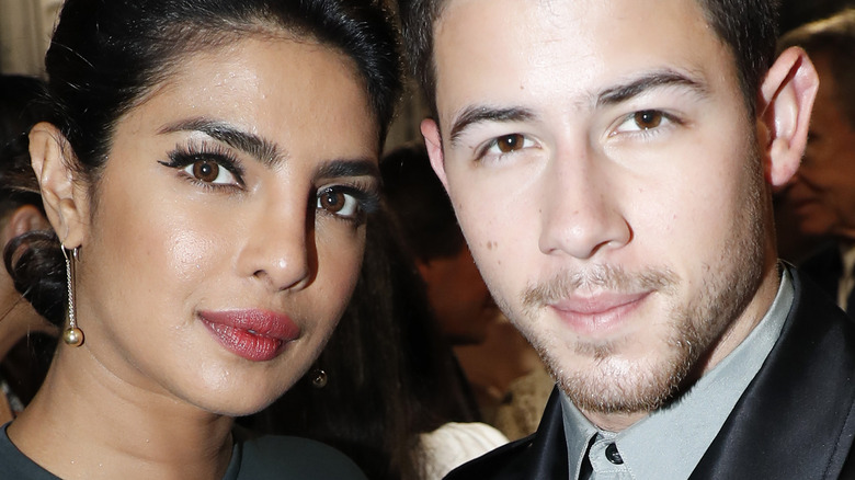 Priyanka Chopra and Nick Jonas posing 