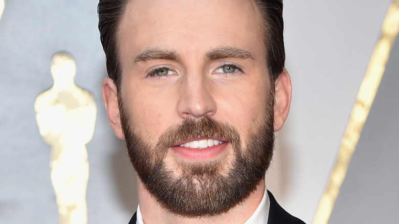 Chris Evans smiling on the red carpet