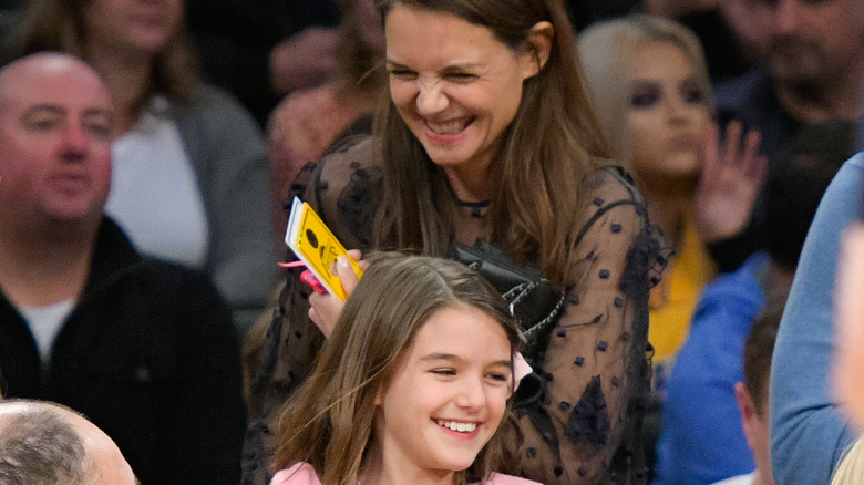 Suri Cruise and Katie Holmes laughing
