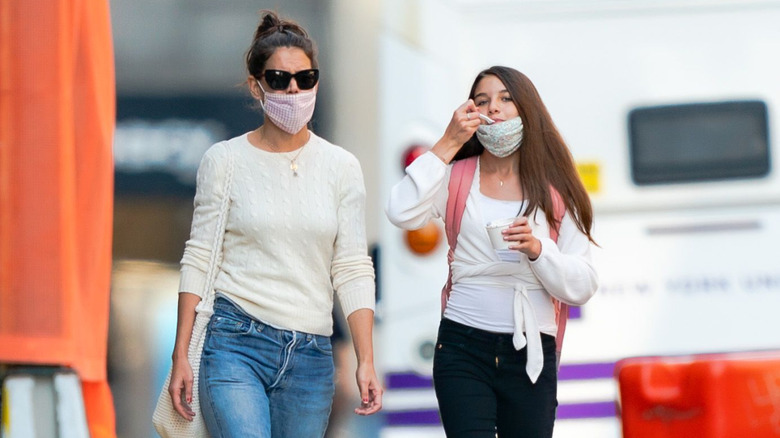 Suri and Katie walking