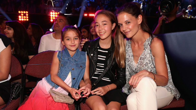 Suri Cruise and Katie Holmes with friend