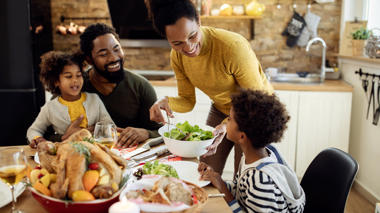 A family having Thanksgiving dinner 