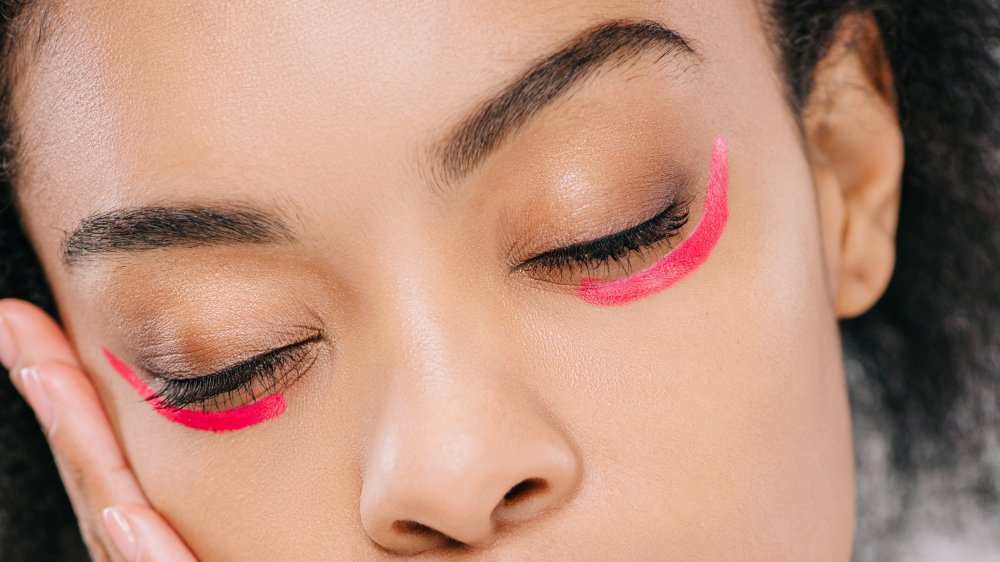  red lipstick covers up bags under eyes