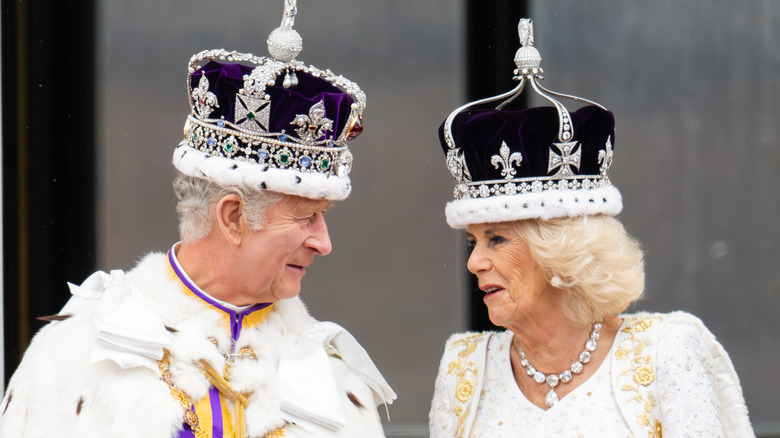 King Charles III and Camilla, Queen Consort talking 