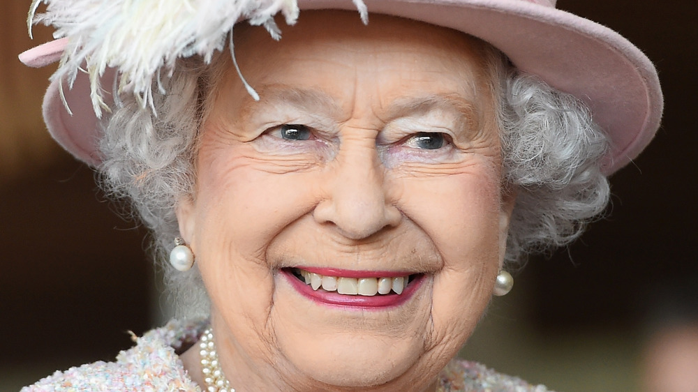 Queen Elizabeth smiles at an event