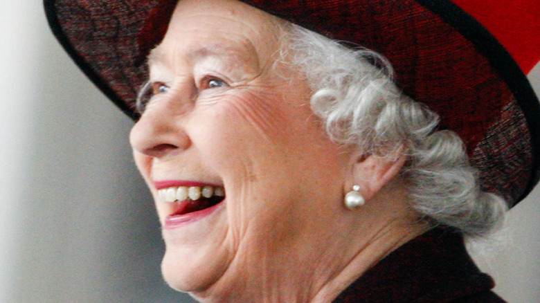 Queen Elizabeth smiling in profile