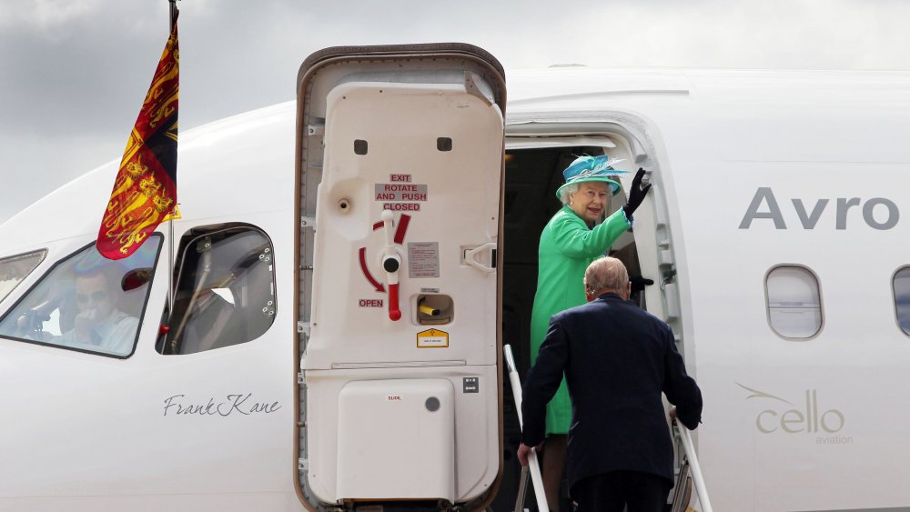 Queen Elizabeth departing a plane