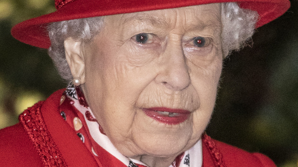 Queen Elizabeth II red hat