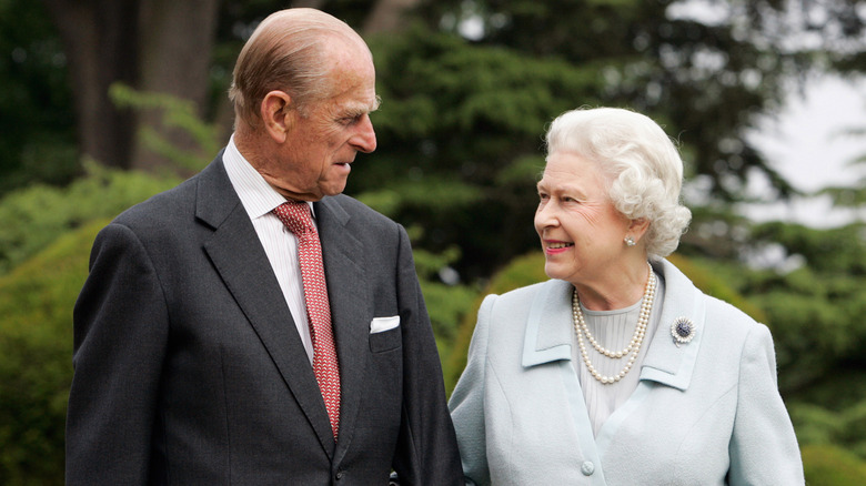 image of Prince Philip and Queen Elizabeth looking at each other in their later years