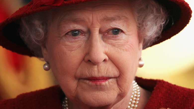 Queen Elizabeth red coat and hat