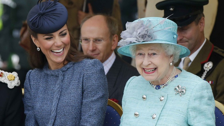 Queen Elizabeth sharing a laugh with Kate Middleton