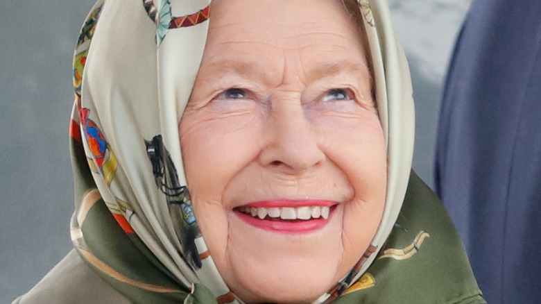 Queen Elizabeth looking up headscarf