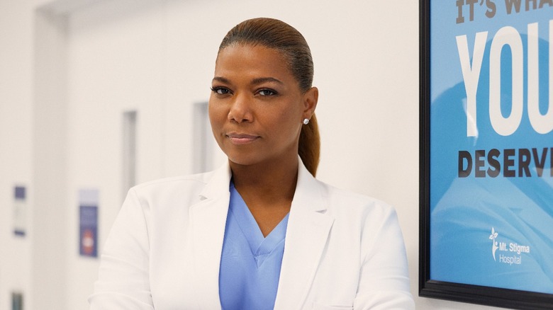 Queen Latifah posing in hospital