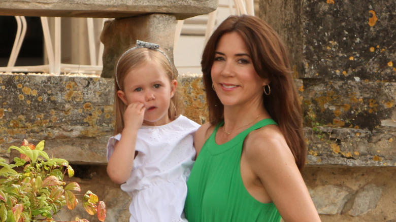 Princess Mary of Denmark holds Princess Josephine in 2014