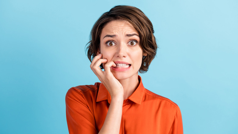 Young woman looking perplexed