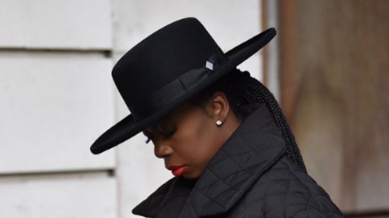 woman wearing wide brim hat