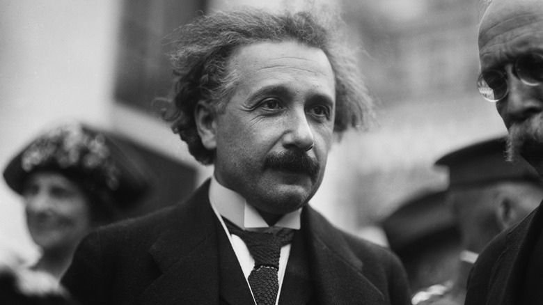 Albert Einstein wearing a suit