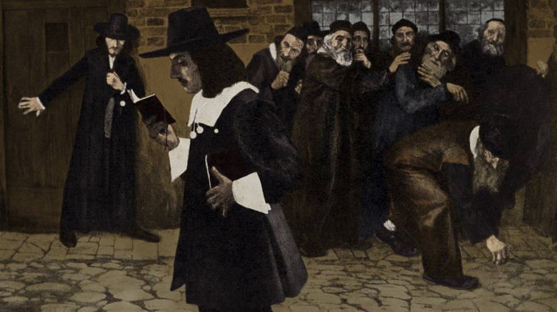 Baruch Spinoza walking with his nose buried in a book past terrified villagers