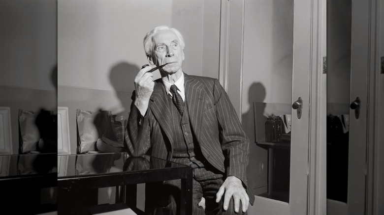 Bertrand Russell smoking a pipe