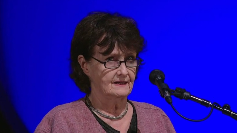 Eavan Boland speaking into microphone