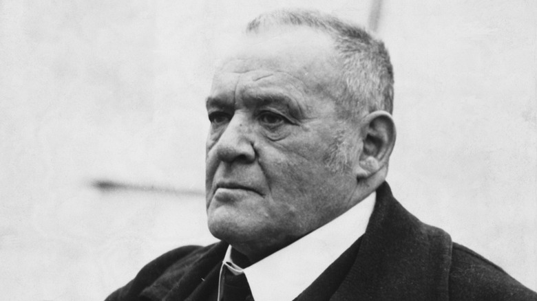 Hilaire Belloc looking thoughtfully into the distance