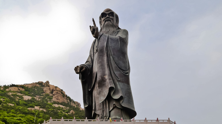 A statue depicting Laozi teaching