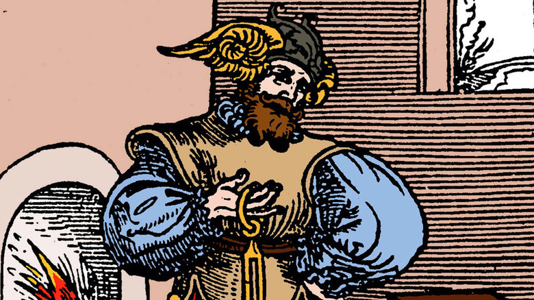 A color picture of Pythagoras holding ancient weighing scales