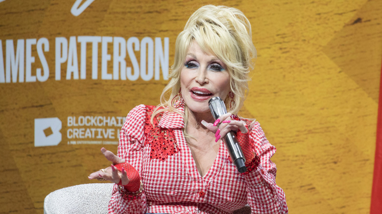 Dolly Parton speaking at an event.