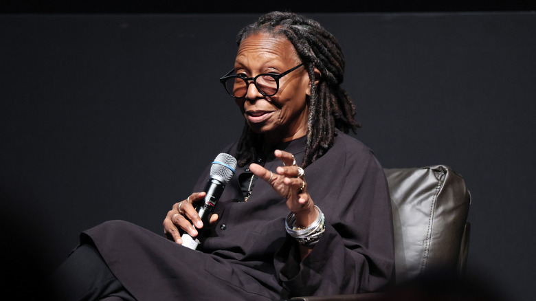 Whoopi Goldberg speaking with microphone