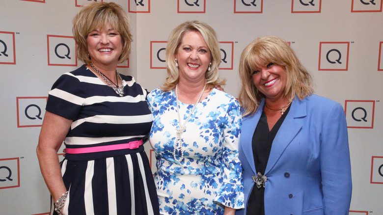Carolyn Gracie, Mary Beth Roe, and Antonella Nester smiling at a 2019 QVC event.