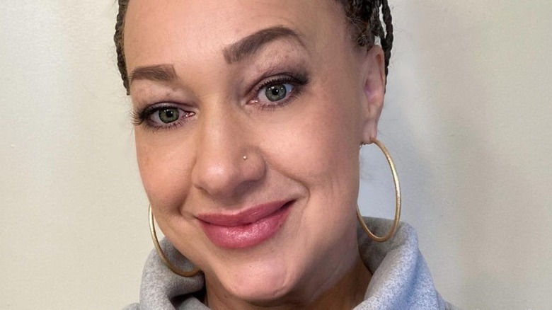 Rachel Dolezal smiling with big earrings