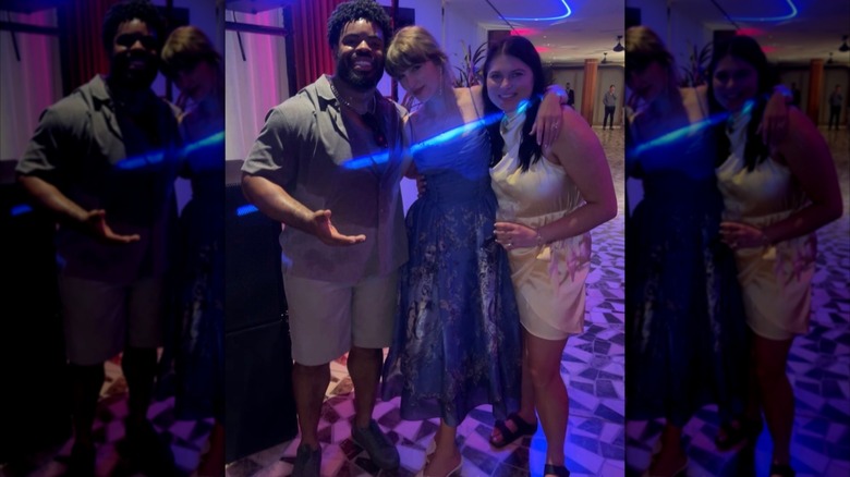 Taylor Swift posing with wedding guests