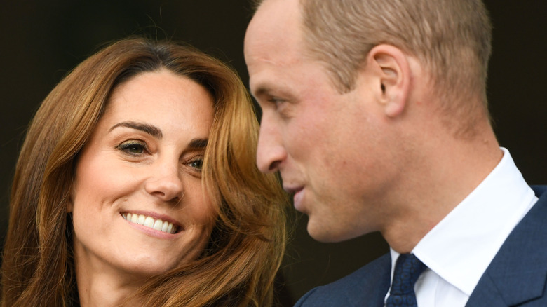 William and Kate smiling at each other 