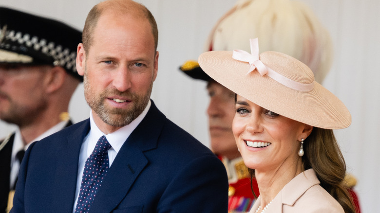 Prince William, Prince of Wales and Catherine, Princess of Wales on the Royal Dais at Datchet Road on July 08, 2025 in Windsor, England.