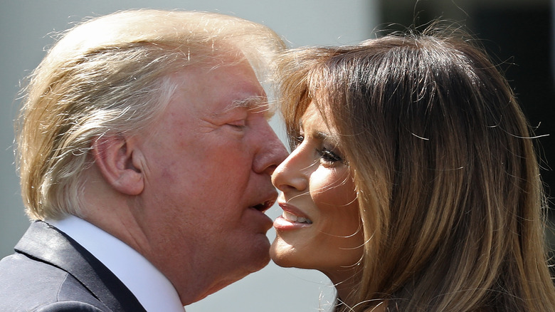 Donald and Melania Trump kissing 