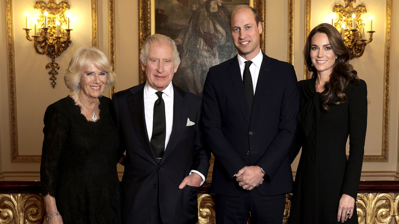 Queen Camilla, King Charles, Prince William, and Princess Catherine posing