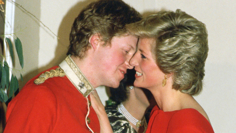 Princess Diana about to give her brother Charles Spencer a kiss