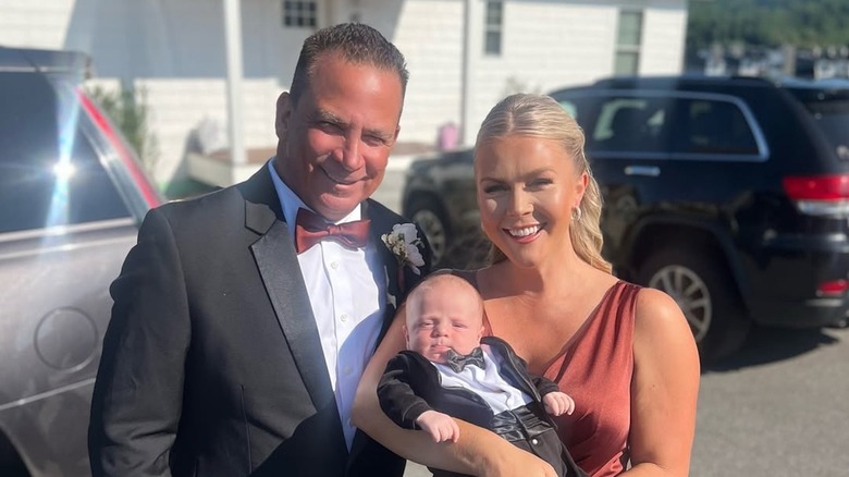 Karoline Leavitt smiles with her husband and son