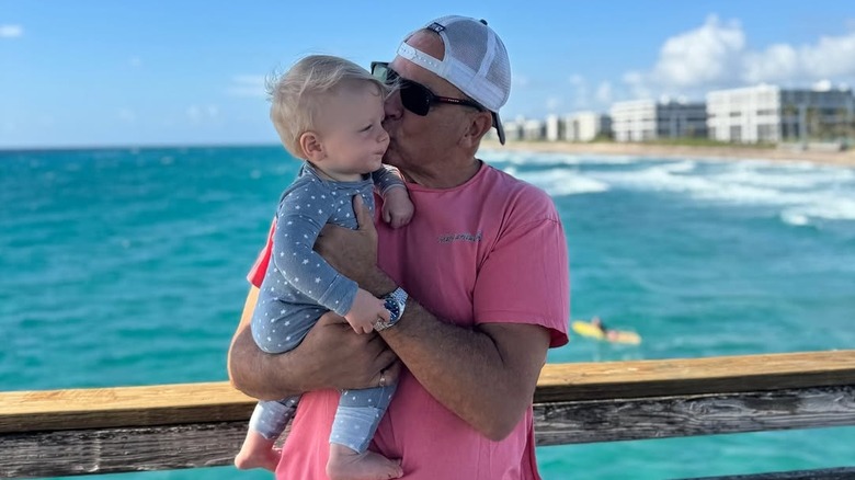 Nicholas Riccio kisses son Niko on the cheek