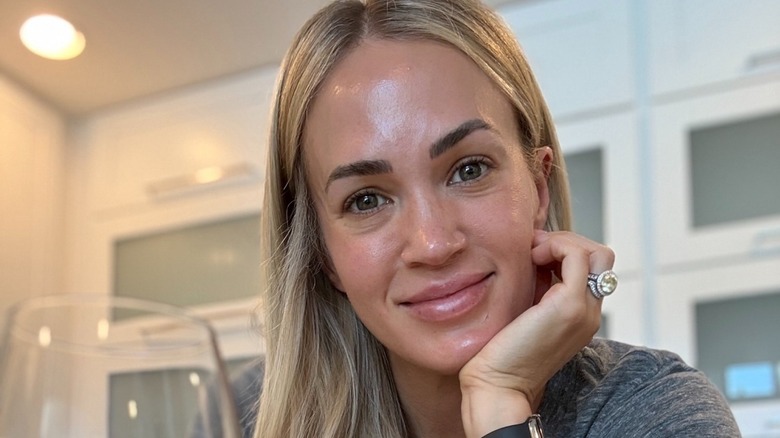 Carrie Underwood with a glass of wine.