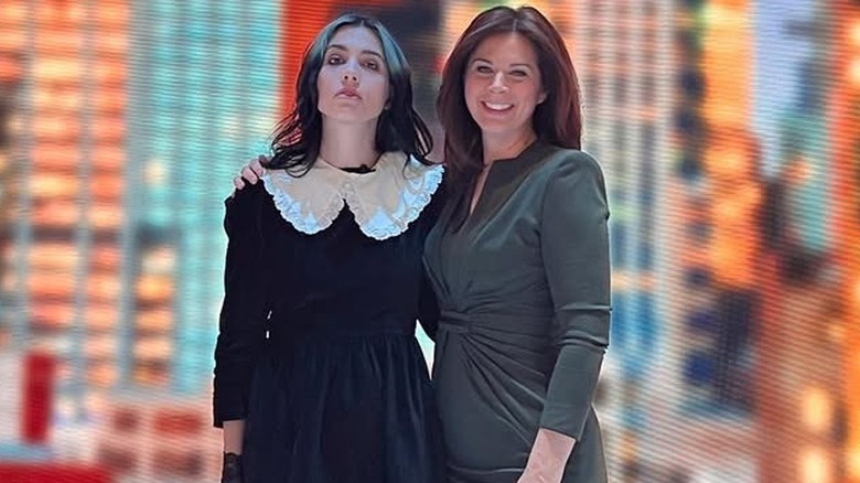 Erin Burnett arm around Nadya Tolokonnikova