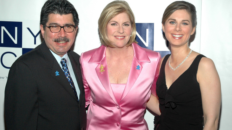 Daniel Burnett, Gail Sue Herrera, and Erin Burnett smiling