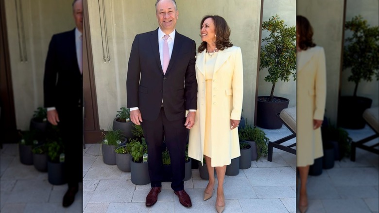 Doug Emhoff and Kamala Harris holding hands