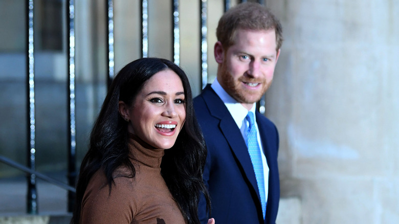 Prince Harry, Duke of Sussex and Meghan, Duchess of Sussex react after their visit to Canada House in thanks for the warm Canadian hospitality and support they received during their recent stay in Canada, on January 7, 2020 in London, England.