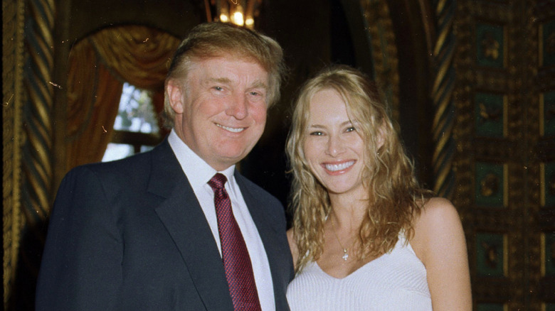 Donald and Melania Trump smiling